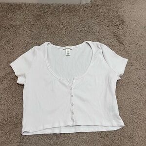This shirt has never been worn before and is in excellent condition.